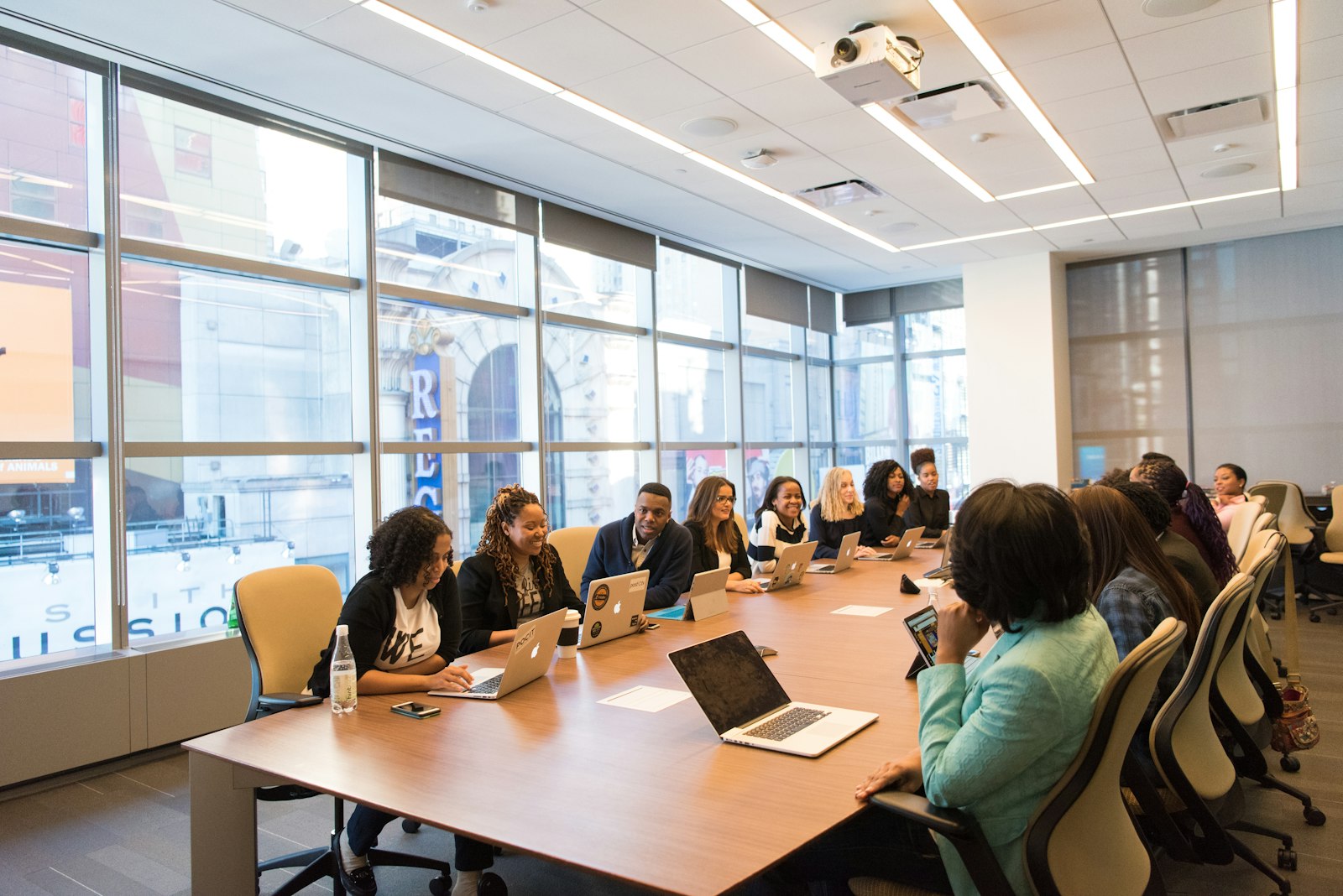 Recruitment team reviewing candidates together in a meeting room